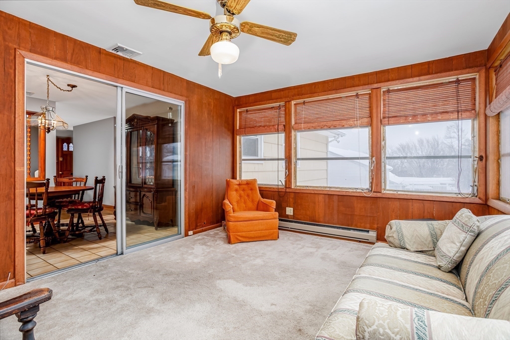 34 Robin Road Worcester, MA 01604 - Photo 29 of 42 a living room with furniture and a large window