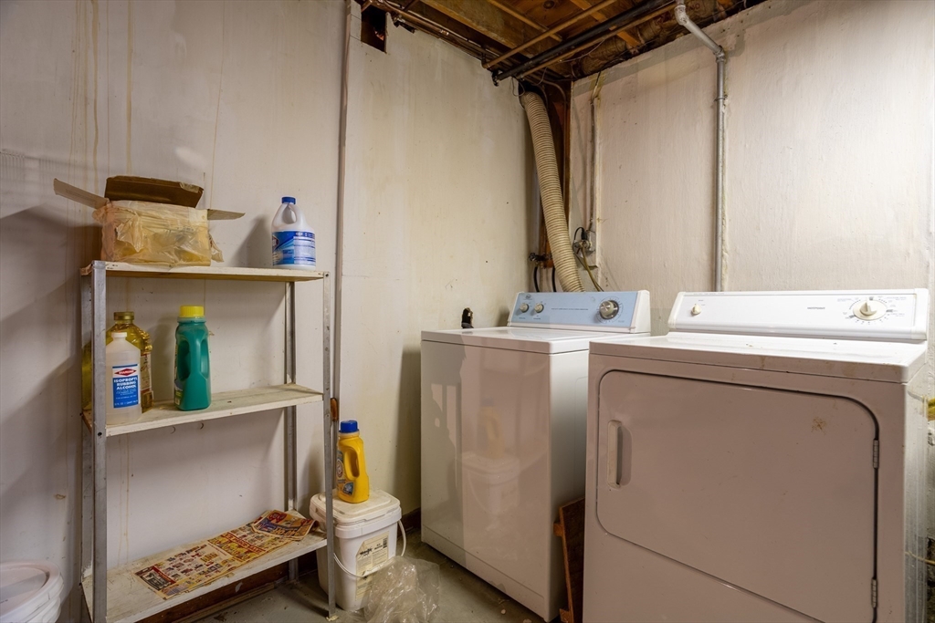 34 Robin Road Worcester, MA 01604 - Photo 35 of 42 a utility room with dryer and washer