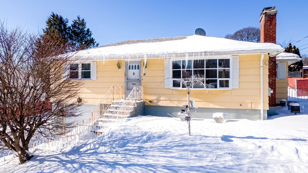 34 Robin Road Worcester, MA 01604 - Photo 4 of 42 a front view of a house with a yard