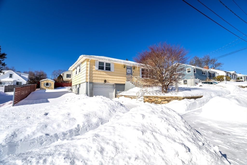 34 Robin Road Worcester, MA 01604 - Photo 5 of 42 a view of a house with snow on the ground