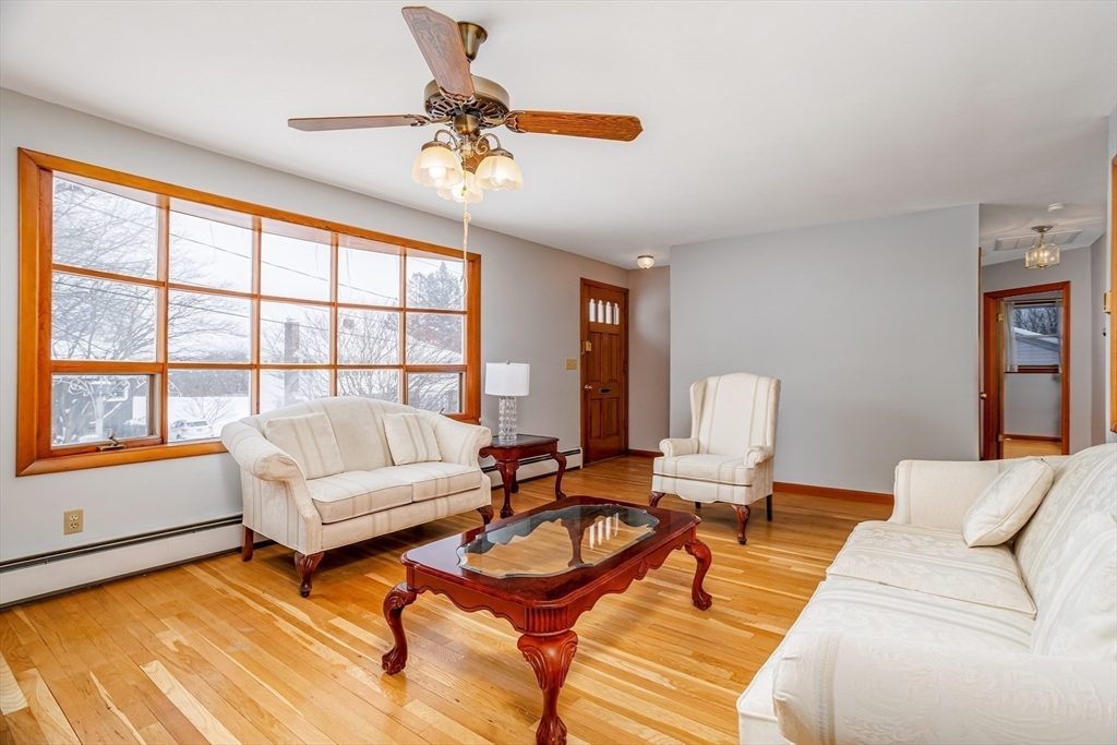 34 Robin Road Worcester, MA 01604 - Photo 10 of 42 a living room with furniture and a large window