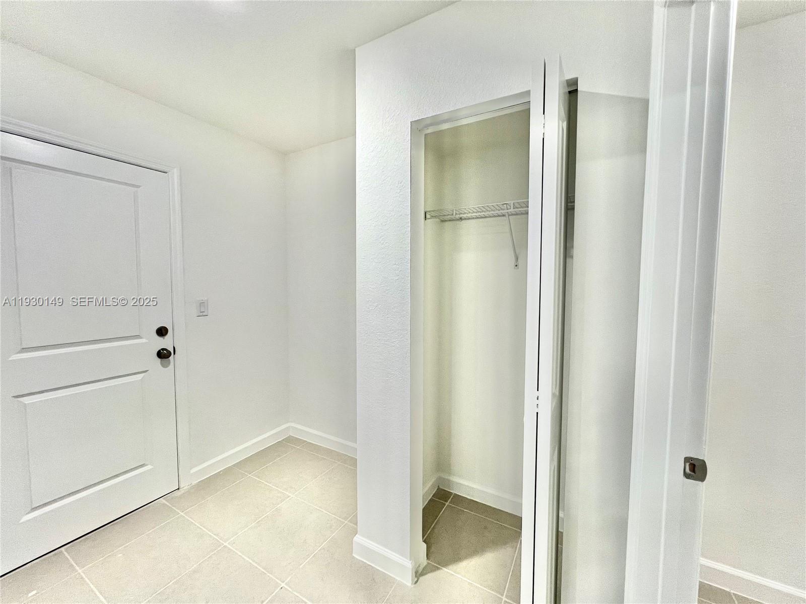 17376 Southwest 285th Street, Unit 1 Homestead, FL 33030 - Photo 26 of 32 a view of an empty room