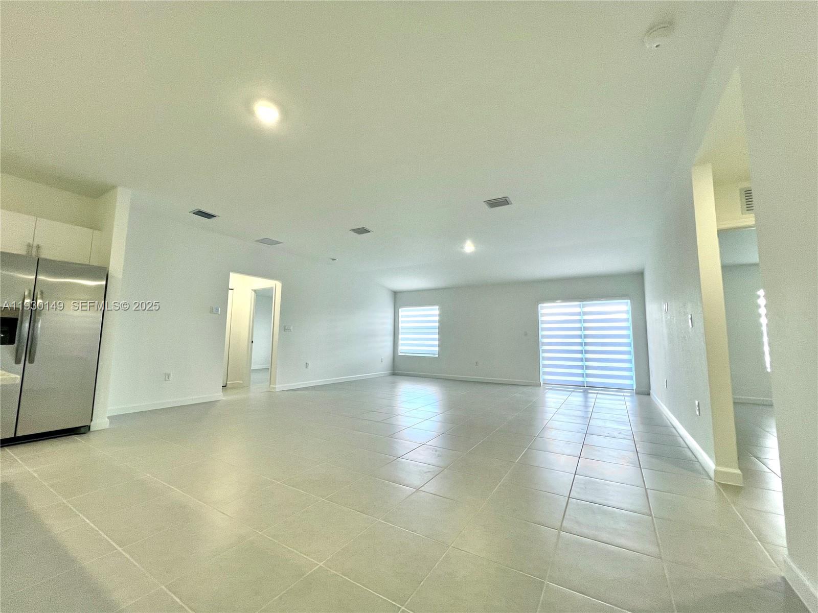 17376 Southwest 285th Street, Unit 1 Homestead, FL 33030 - Photo 8 of 32 a view of empty room