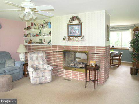 5218 Forge Road Perry Hall, MD 21128 - Photo 11 of 22 a living room with furniture and a table