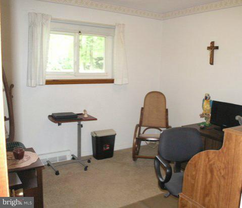 5218 Forge Road Perry Hall, MD 21128 - Photo 20 of 22 a view of a workspace with furniture and a window