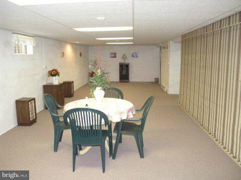 5218 Forge Road Perry Hall, MD 21128 - Photo 3 of 22 a view of a dining room with furniture
