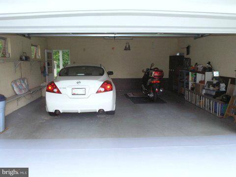 5218 Forge Road Perry Hall, MD 21128 - Photo 21 of 22 a white car parked in front of a building