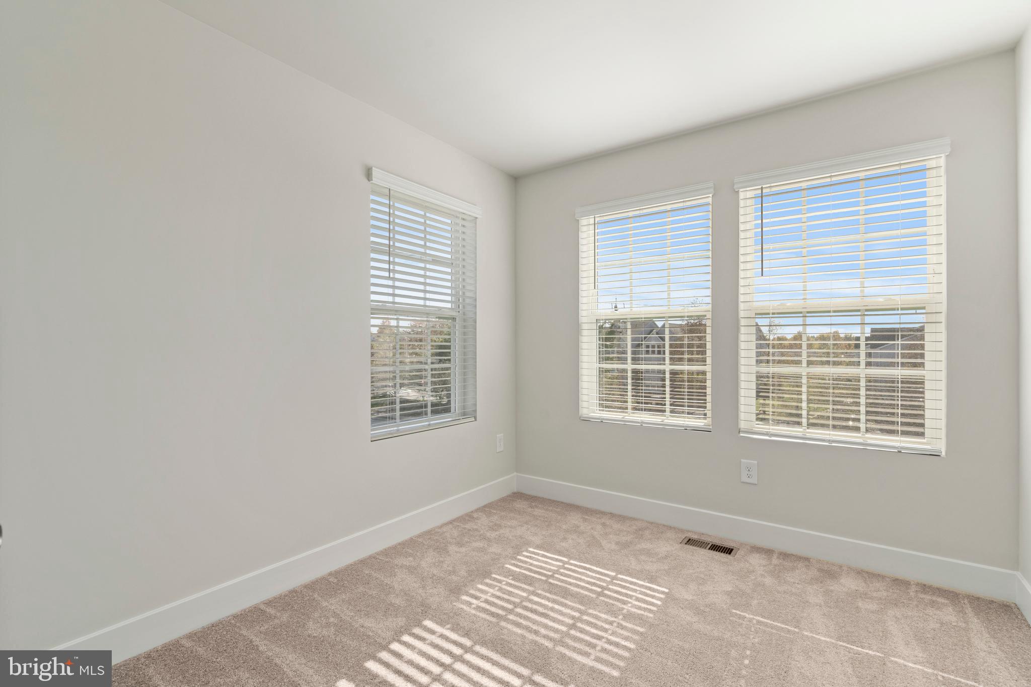7550 Johnnycake Road Windsor Mill, MD 21244 - Photo 18 of 36 a view of an empty room with a window