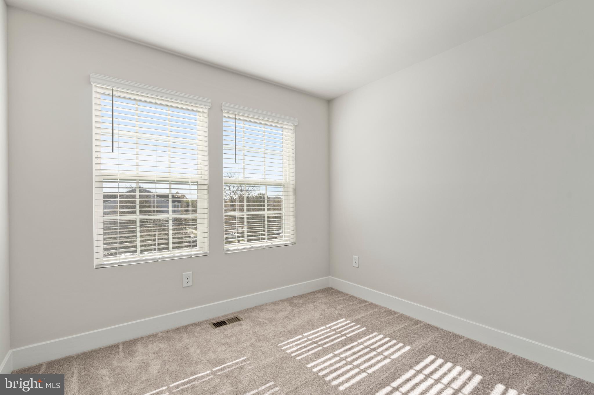 7550 Johnnycake Road Windsor Mill, MD 21244 - Photo 20 of 36 a view of an empty room with a window