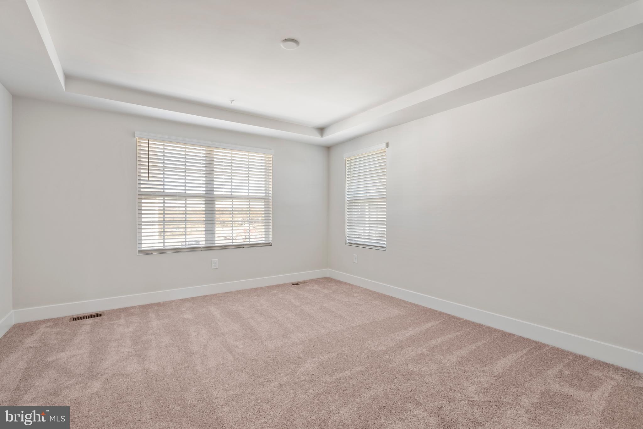 7550 Johnnycake Road Windsor Mill, MD 21244 - Photo 24 of 36 an empty room with windows