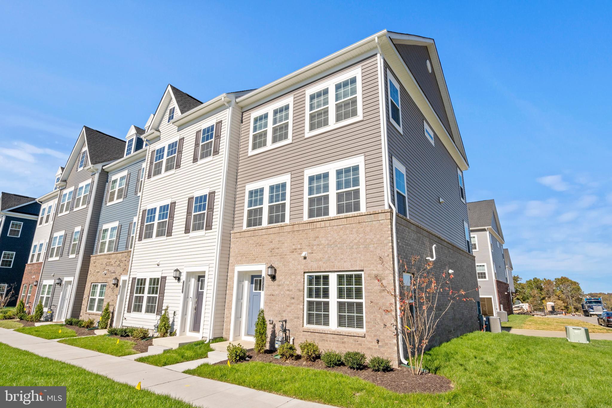 7550 Johnnycake Road Windsor Mill, MD 21244 - Photo 3 of 36 a front view of a house with a yard