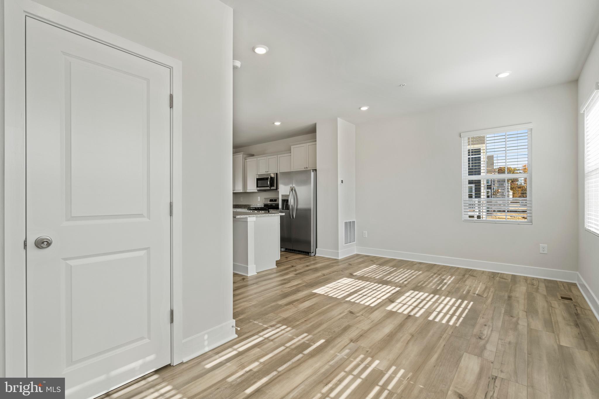 7550 Johnnycake Road Windsor Mill, MD 21244 - Photo 7 of 36 a view of kitchen with wooden floor
