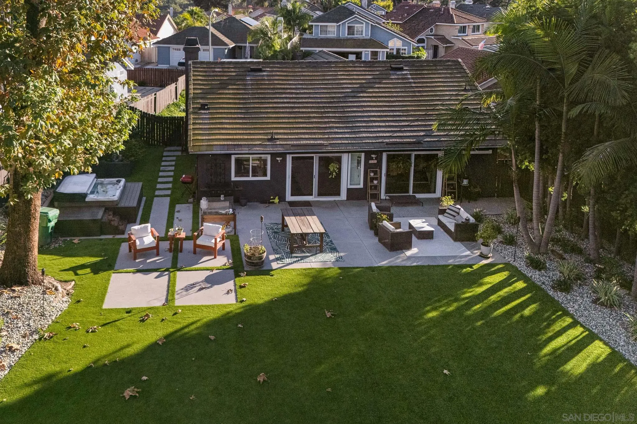 5358 Raspberry Way Oceanside, CA 92057 - Photo 30 of 31 a view of a house with a yard porch and sitting area