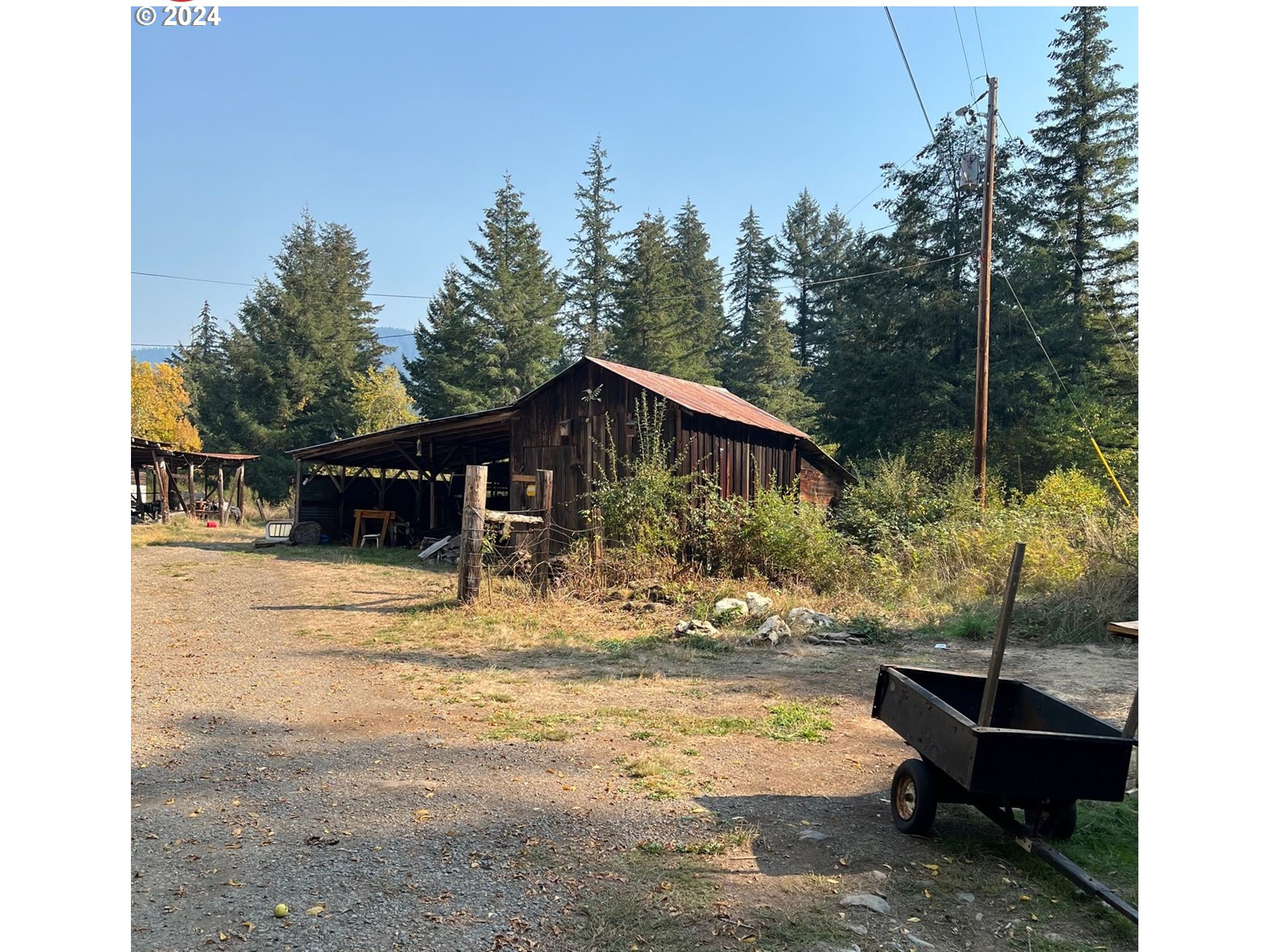 39802 Layng Creek Road Dorena, OR 97434 - Photo 5 of 6 a view of a house with backyard and sitting area