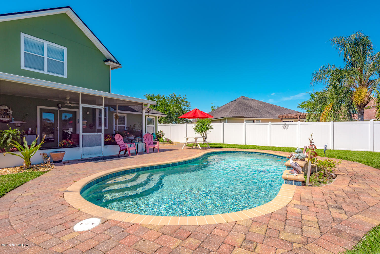 902 East Red House Branch Road St. Augustine, FL 32084 - Photo 19 of 39 a view of a backyard with plants and patio