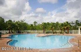 902 East Red House Branch Road St. Augustine, FL 32084 - Photo 32 of 39 a view of a swimming pool with an outdoor seating