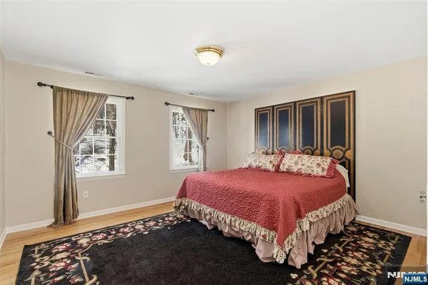 a view of an empty room with a couch