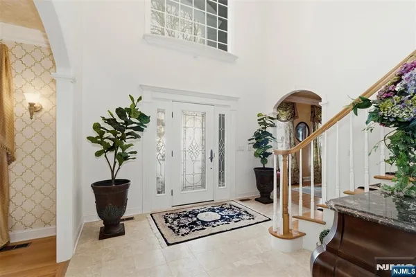 a vase of flowers sitting on a table