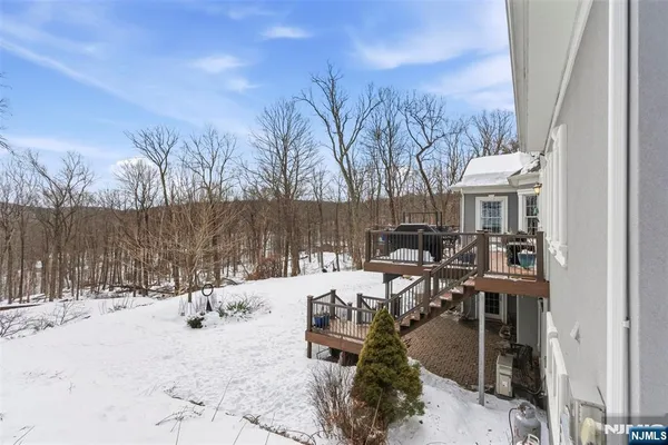 a view of roof with sitting area