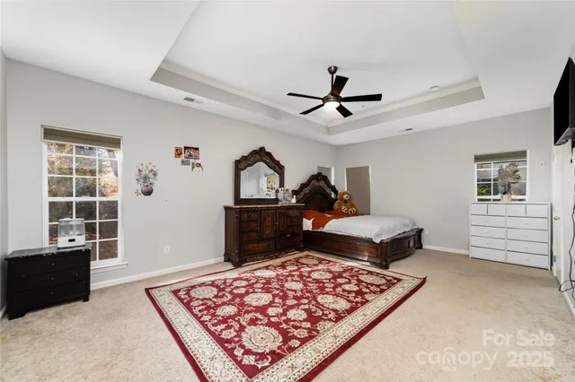a living room with a couch and dresser