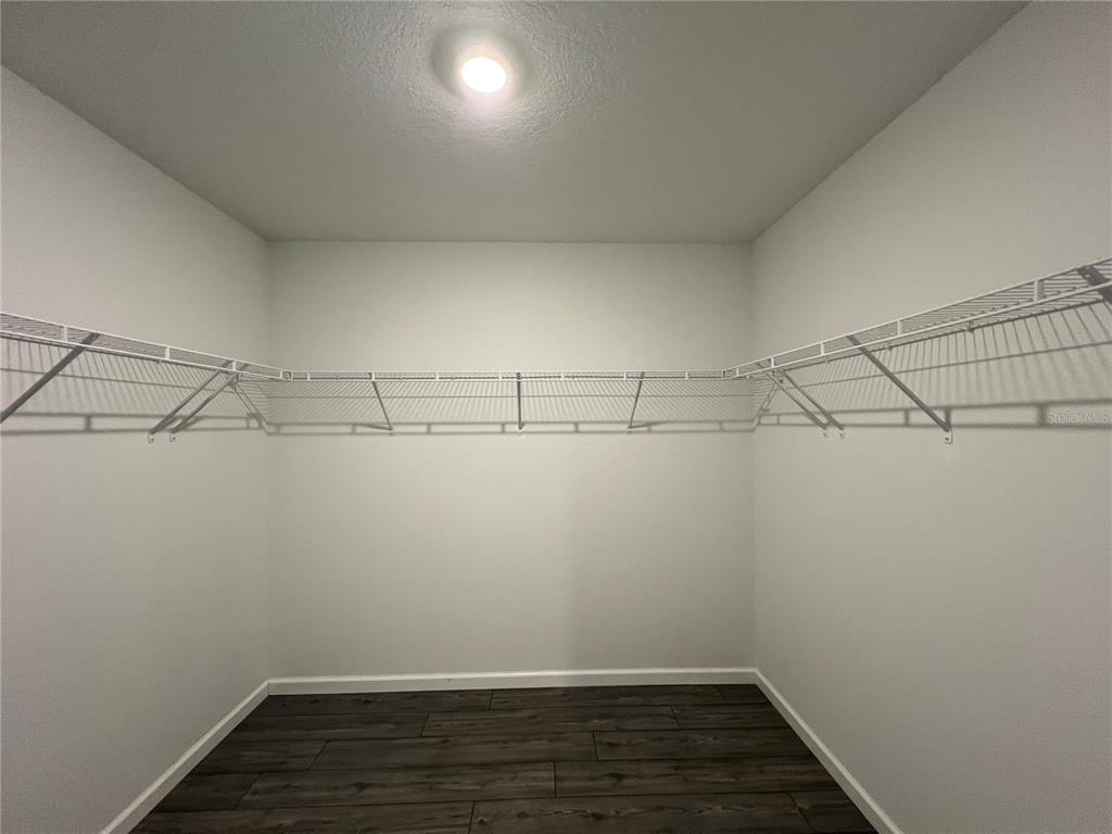 4576 Southwest 84th St Road Ocala, FL 34476 - Photo 20 of 50 a view of a room with racks on the wall