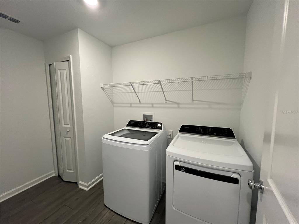 4576 Southwest 84th St Road Ocala, FL 34476 - Photo 25 of 50 a utility room with dryer and washer