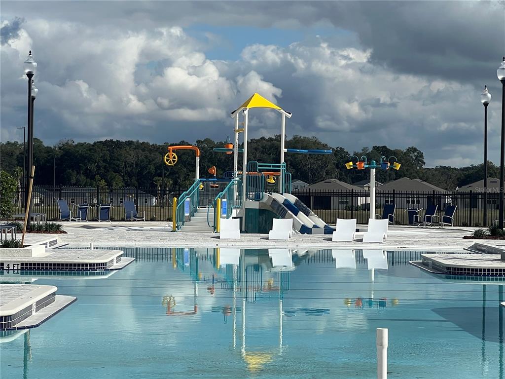 4576 Southwest 84th St Road Ocala, FL 34476 - Photo 39 of 50 a view of a swimming pool with outdoor seating