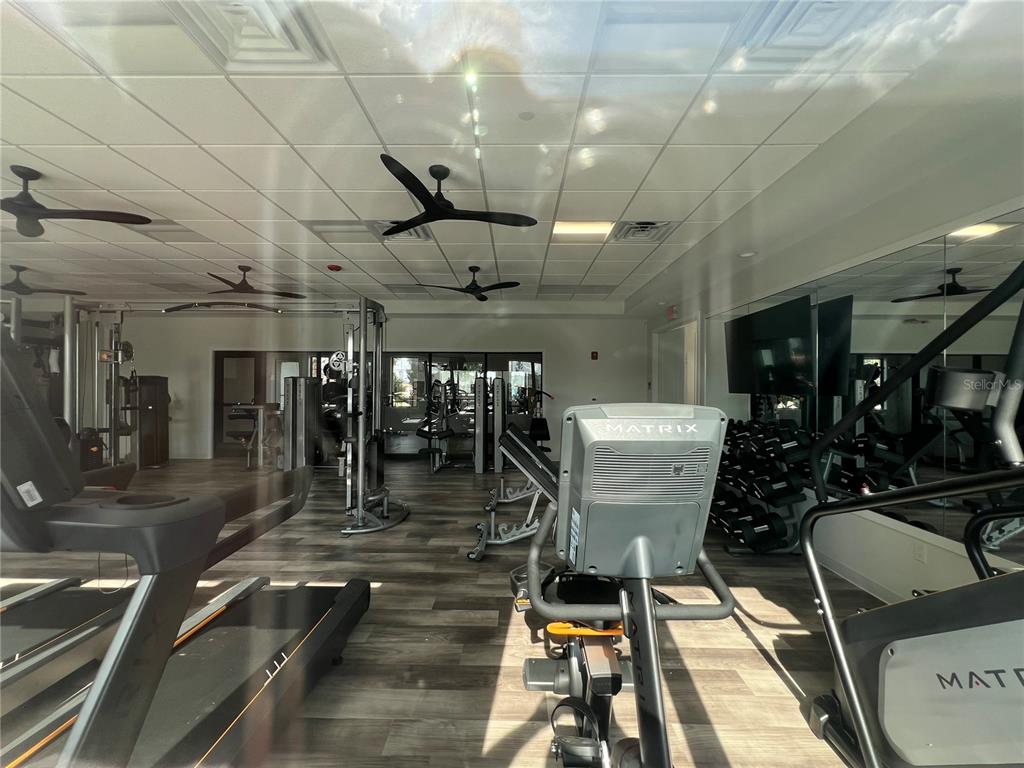 4576 Southwest 84th St Road Ocala, FL 34476 - Photo 41 of 50 a room with lots of gym equipment