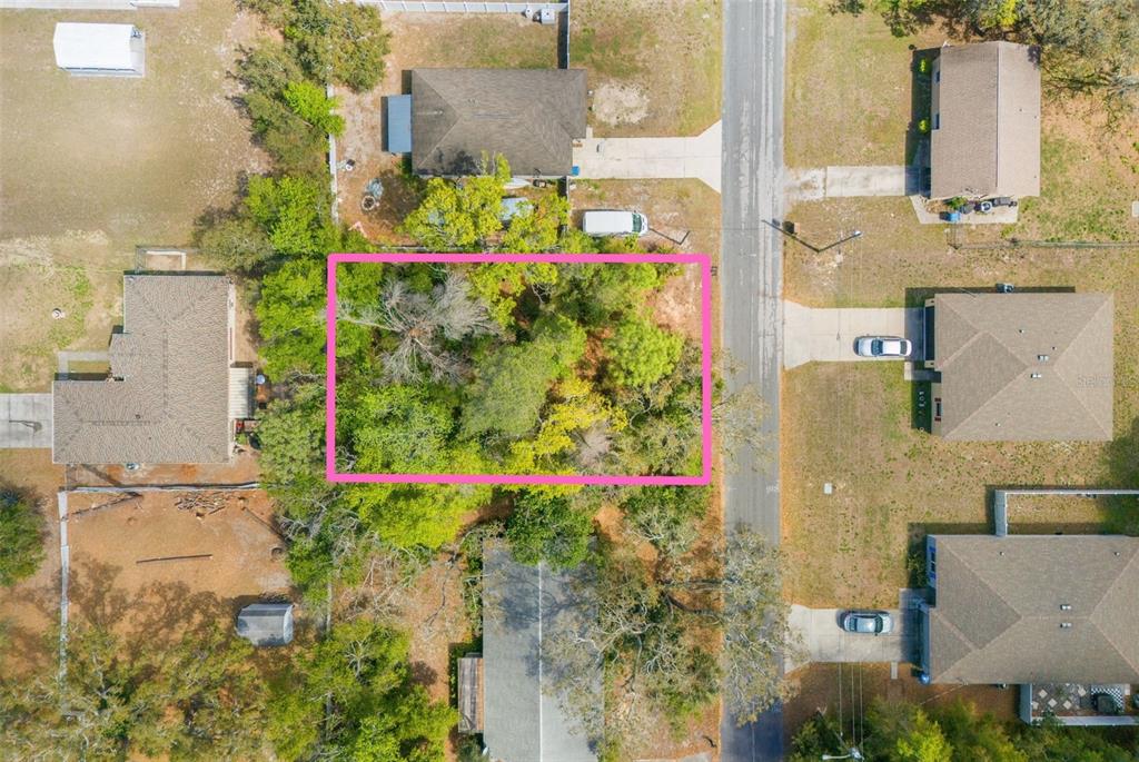 7491 Blackhawk Trail Spring Hill, FL 34606 - Photo 1 of 1 an aerial view of a city