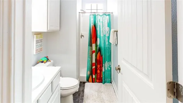 a bed room with a bed and a couch