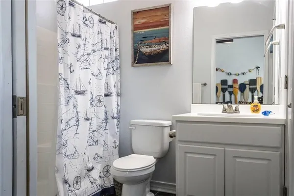 a view of a swimming pool with sitting area