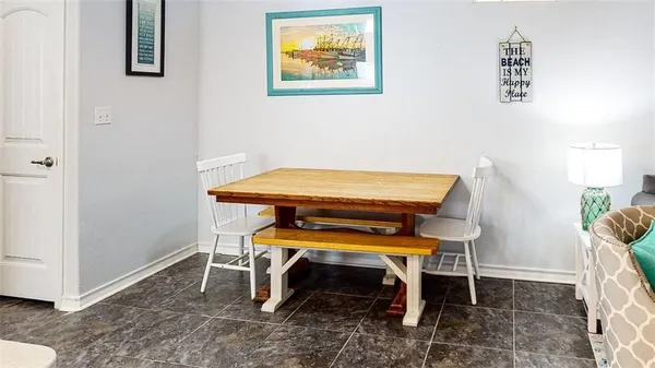 a room with a table and a chair