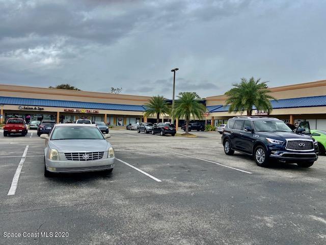 678 North Wickham Road, Unit 670686 Melbourne, FL 32935 - Photo 3 of 5 a car parked in garage