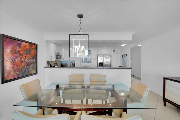 a view of kitchen with microwave and cabinets