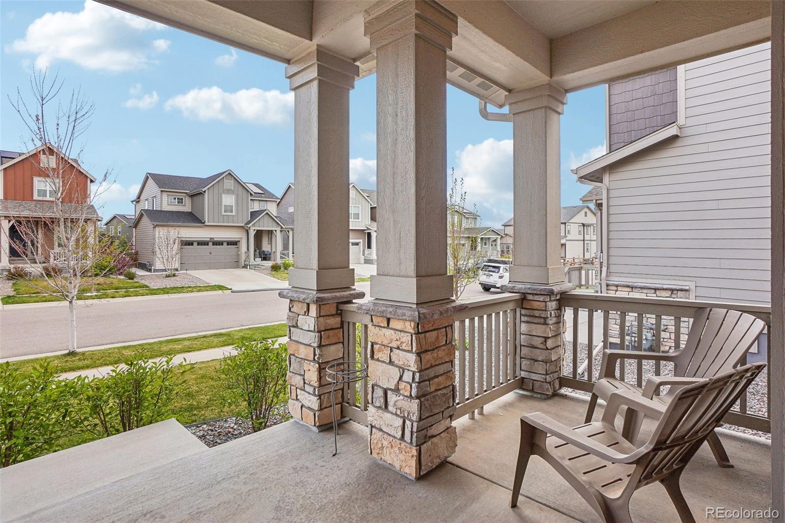 12797 Clearview Street Firestone, CO 80504 - Photo 2 of 44 a view of a balcony with furniture