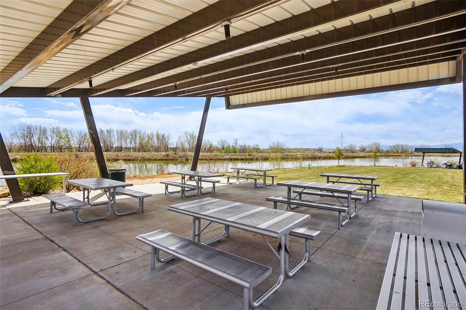 12797 Clearview Street Firestone, CO 80504 - Photo 41 of 44 a view of swimming pool with outdoor seating space