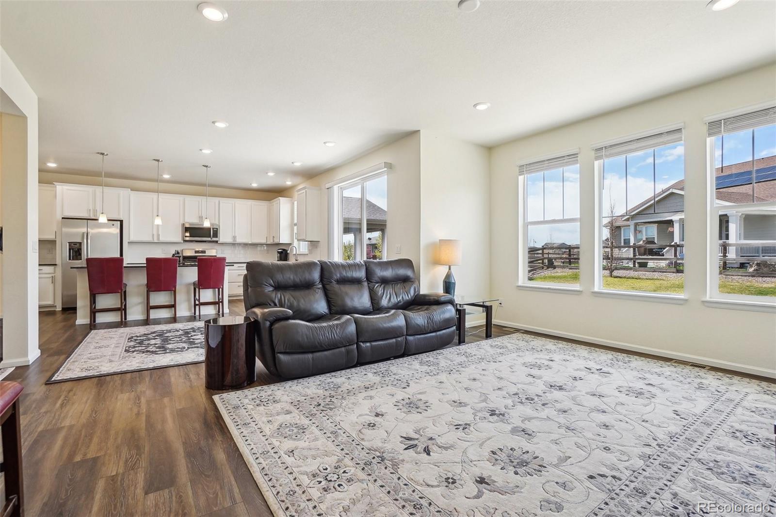 12797 Clearview Street Firestone, CO 80504 - Photo 10 of 44 a living room with furniture and a window