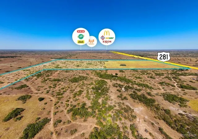 a view of a hall with wooden floor