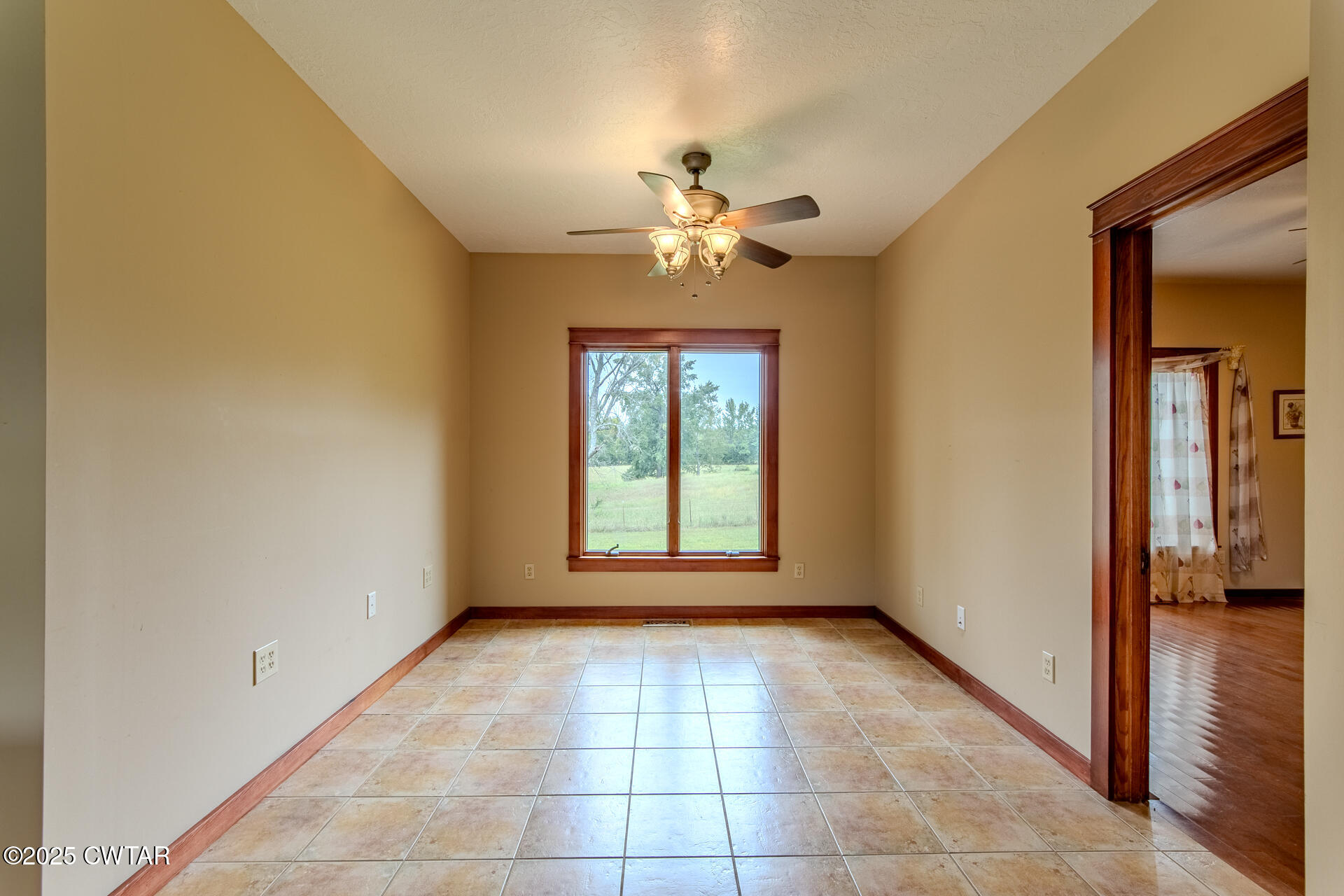 3554 Shades Bridge Road Greenfield, TN 38230 - Photo 15 of 49 a view of an empty room with a window
