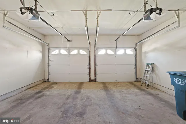 a view of house with balcony and outdoor space