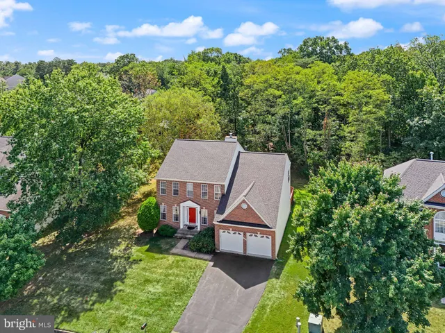 an aerial view of a house with a garden