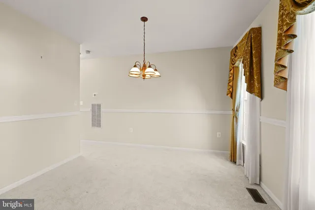 a view of a refrigerator in the kitchen