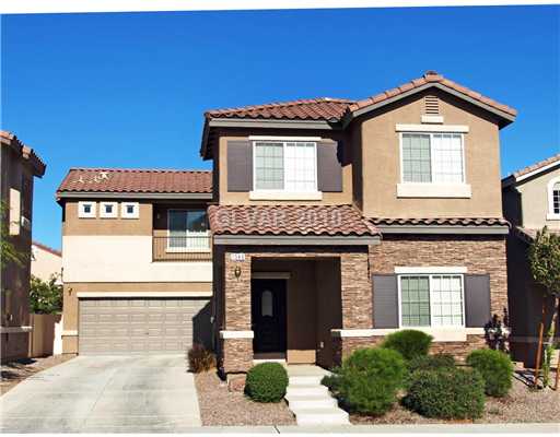 1348 Spice Ridge Court Henderson, NV 89012 - Photo 2 of 8 Property Photo. Elegant flagstone exterior surrounds first floor and entry.