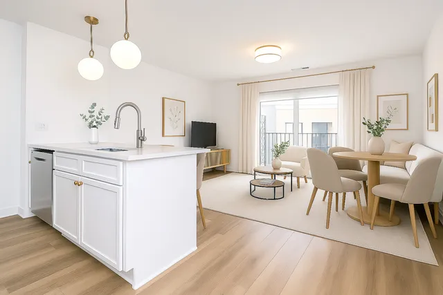 a kitchen with cabinets and stainless steel appliances