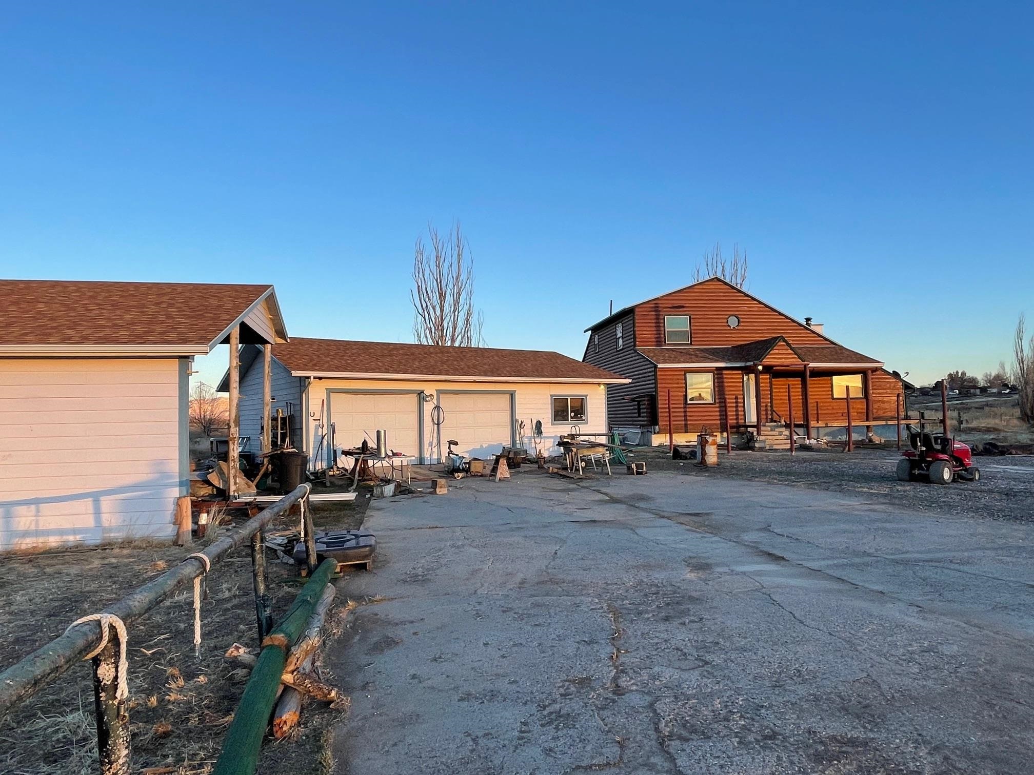 1268-17 17 1/2 Road Fruita, CO 81521 - Photo 19 of 40 a view of a house with a patio