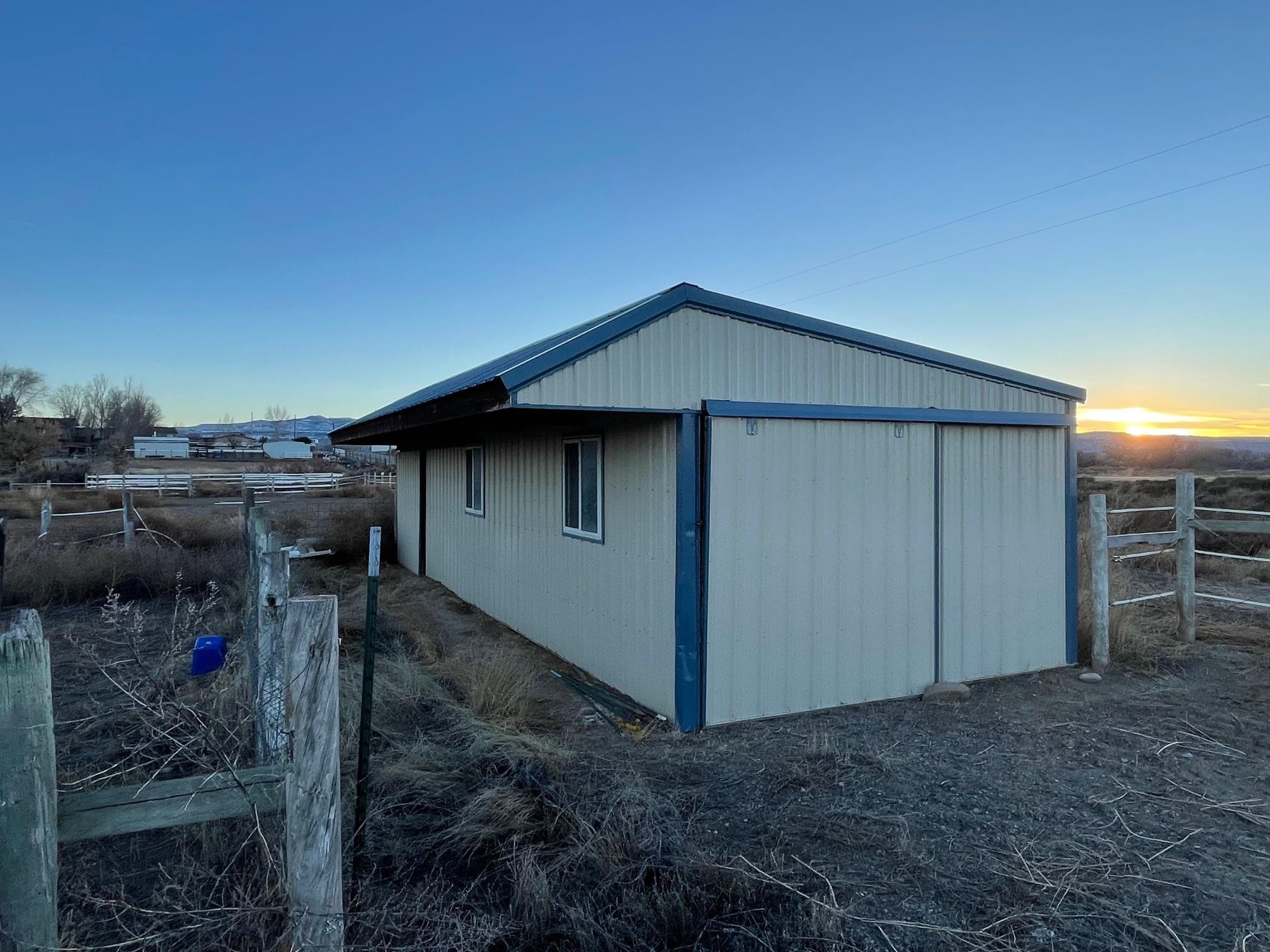 1268-17 17 1/2 Road Fruita, CO 81521 - Photo 20 of 40 a house view with a backyard space