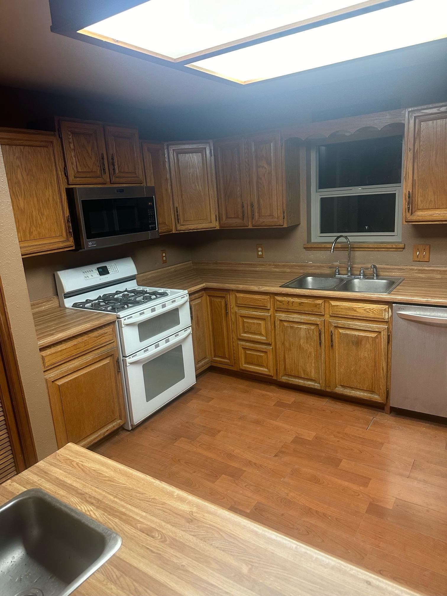 1268-17 17 1/2 Road Fruita, CO 81521 - Photo 26 of 40 a kitchen with a sink cabinets and appliances