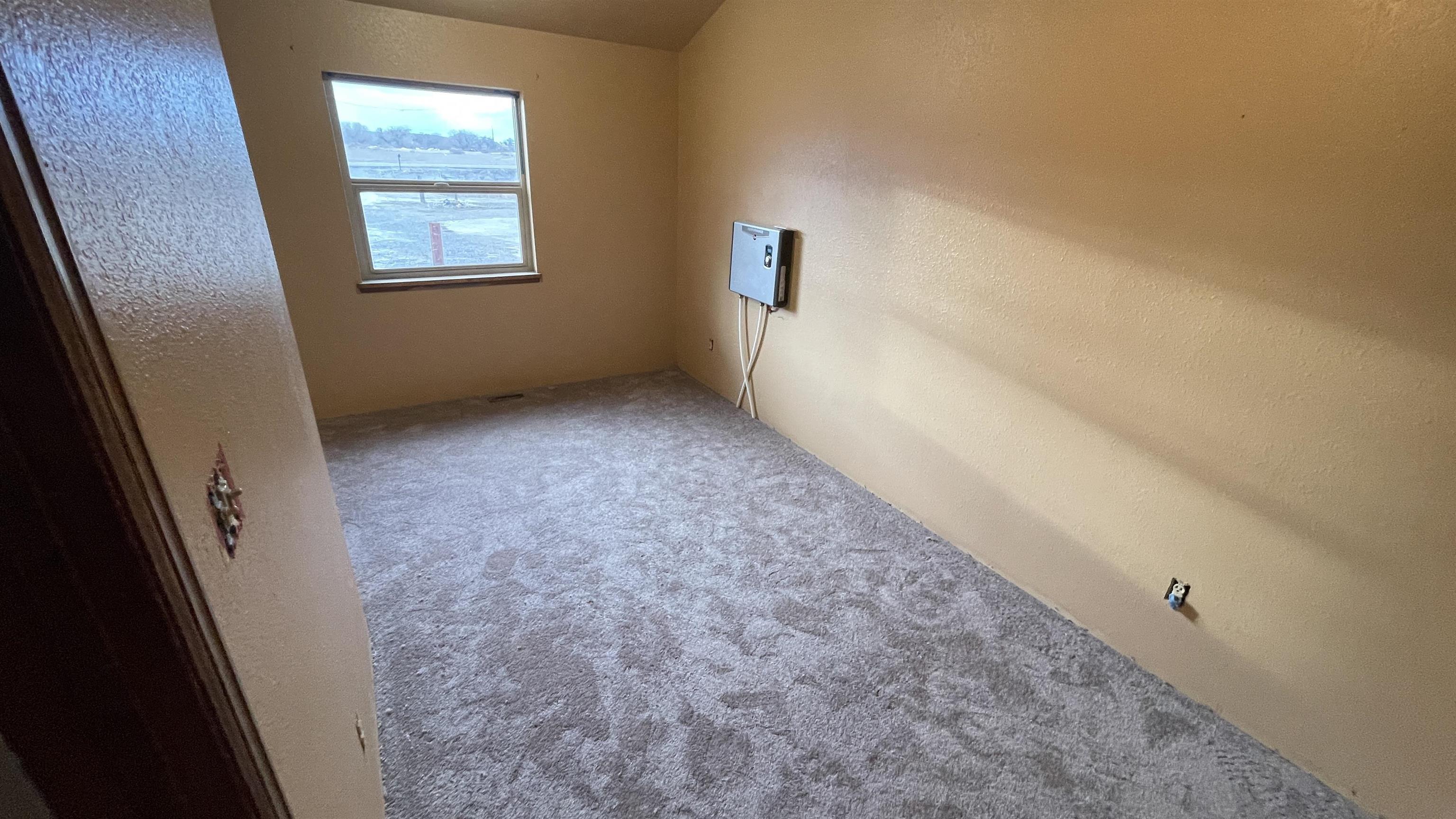 1268-17 17 1/2 Road Fruita, CO 81521 - Photo 30 of 40 an empty room with windows