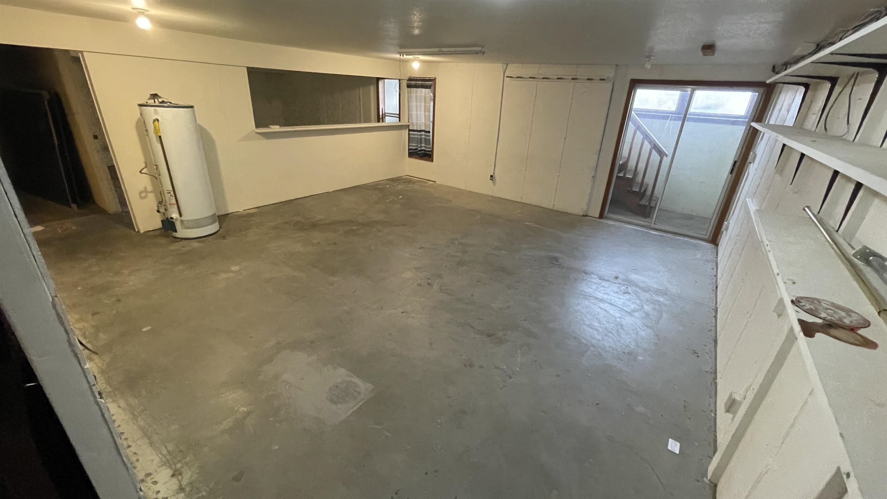 1268-17 17 1/2 Road Fruita, CO 81521 - Photo 36 of 40 a view of empty room with wooden floor and fan