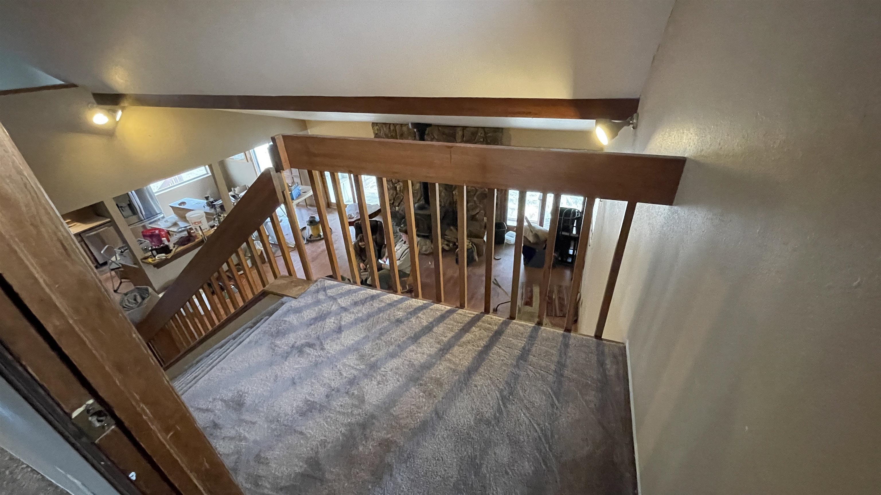 1268-17 17 1/2 Road Fruita, CO 81521 - Photo 37 of 40 a view of a hallway with wooden floor